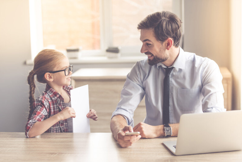 Handsome businessman and his daughter