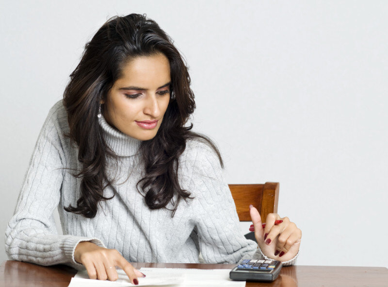 Woman working on bills