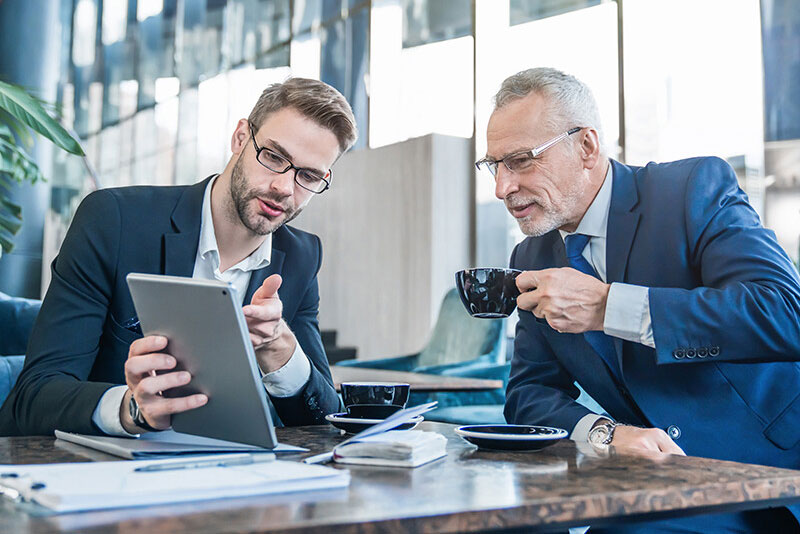 Business Partners Reviewing Files