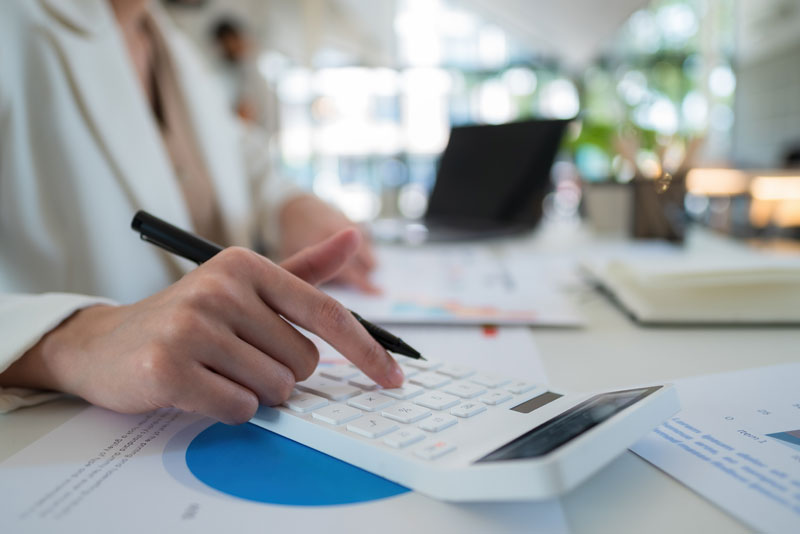 Business Woman Working on Financial Calculations