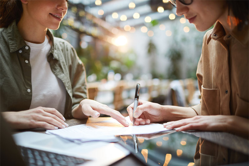 Business Women Working in a Cafe