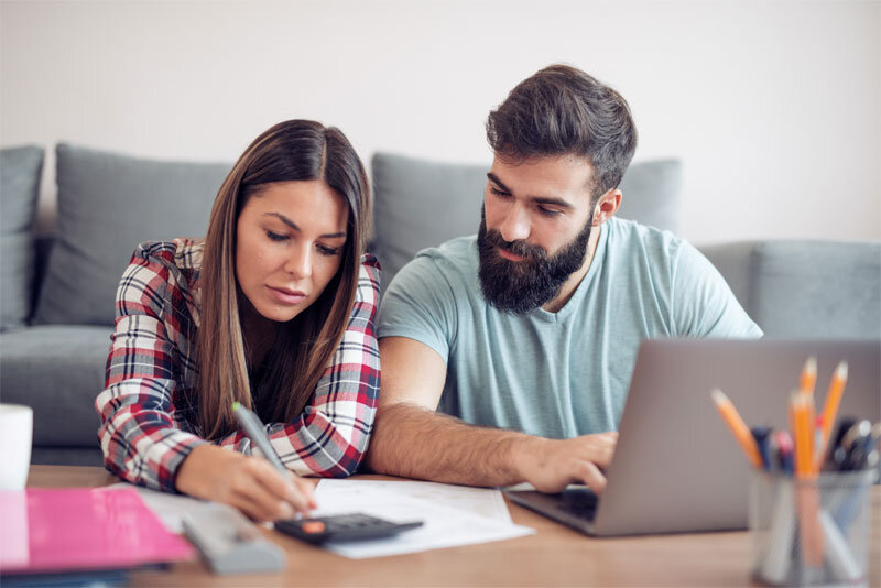 Couple Using Calculator