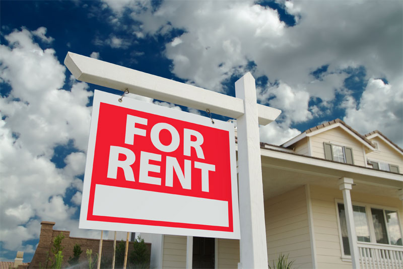 For Rent Sign in Front of House