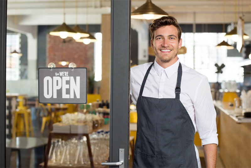 Man Holding Open Sign