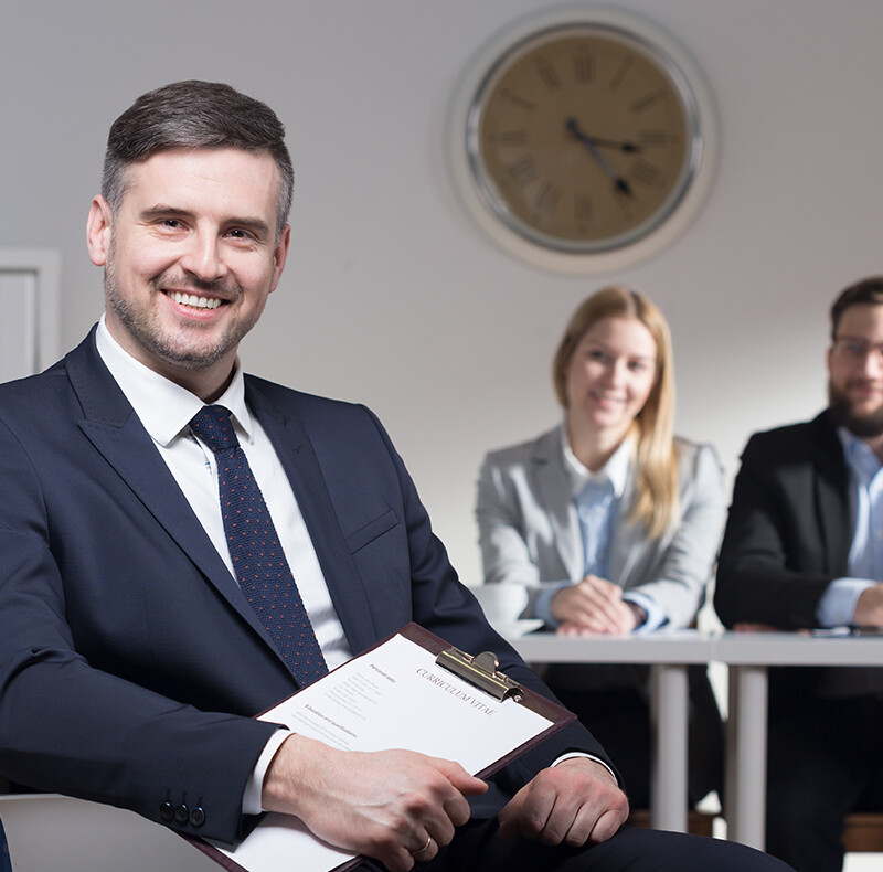 Man Holding Paperwork