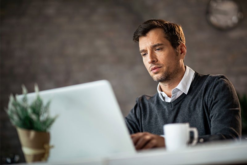 Man Working on Laptop